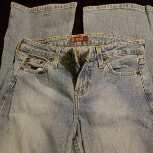 Boot cut button pocket jean